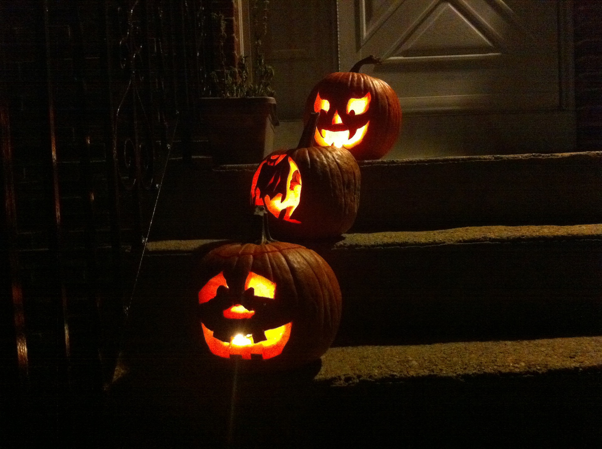 lit jack'o lanterns on stairs